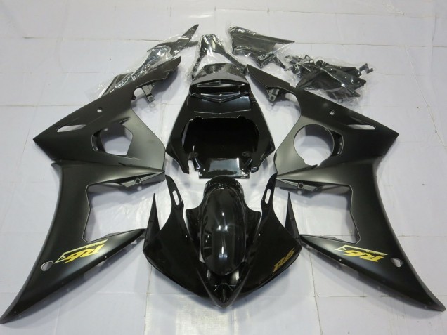 Acquista Carene Moto Yamaha R6 2003-2004 - Nero Lucido Nero Opaco Oro Decals